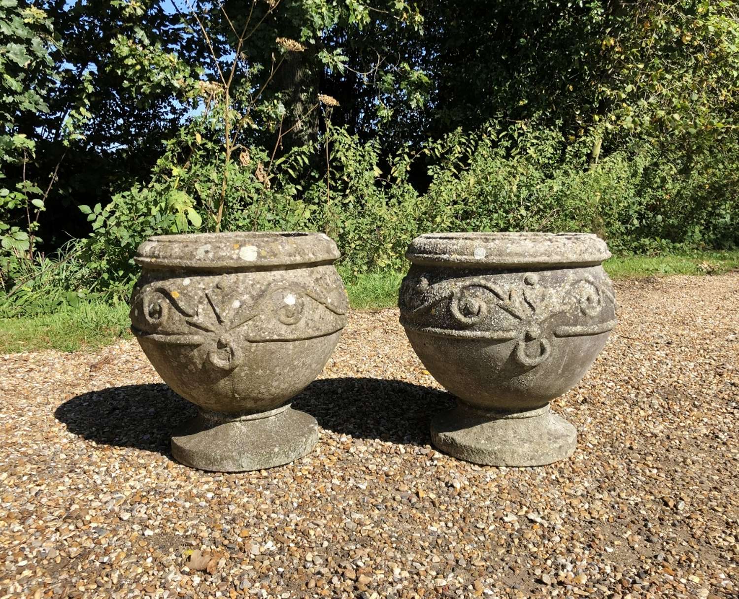 Pair of Weathered Bowl Urns