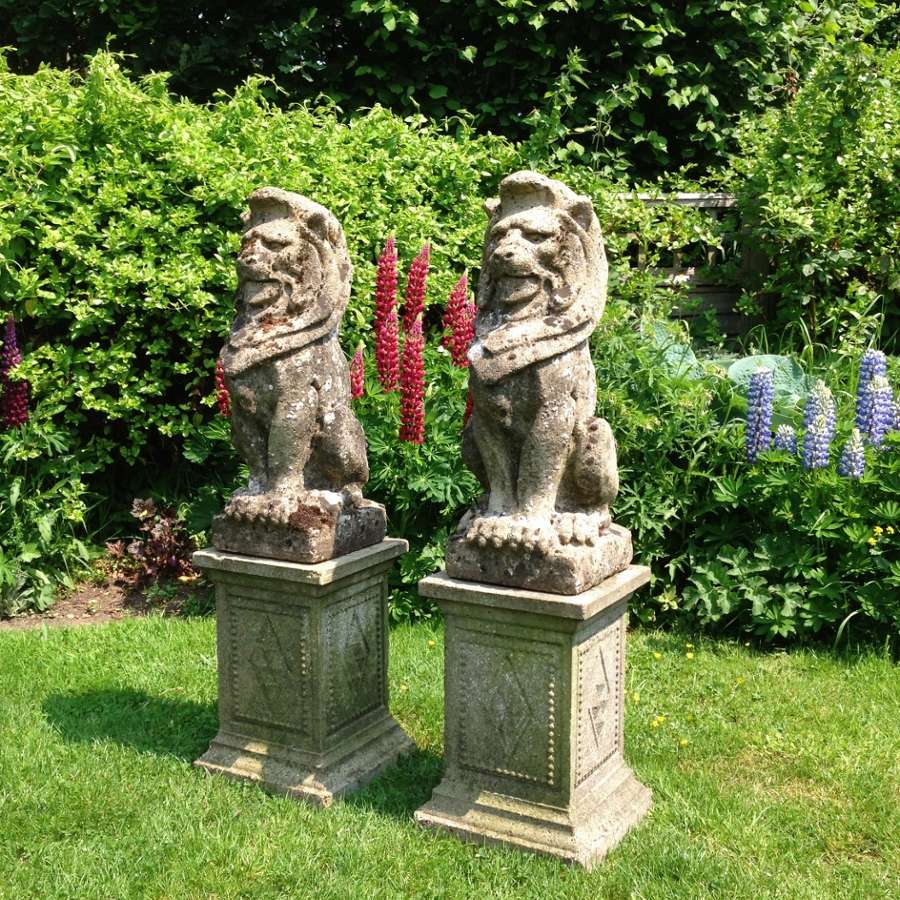 Pair of Large Lions and Pedestals