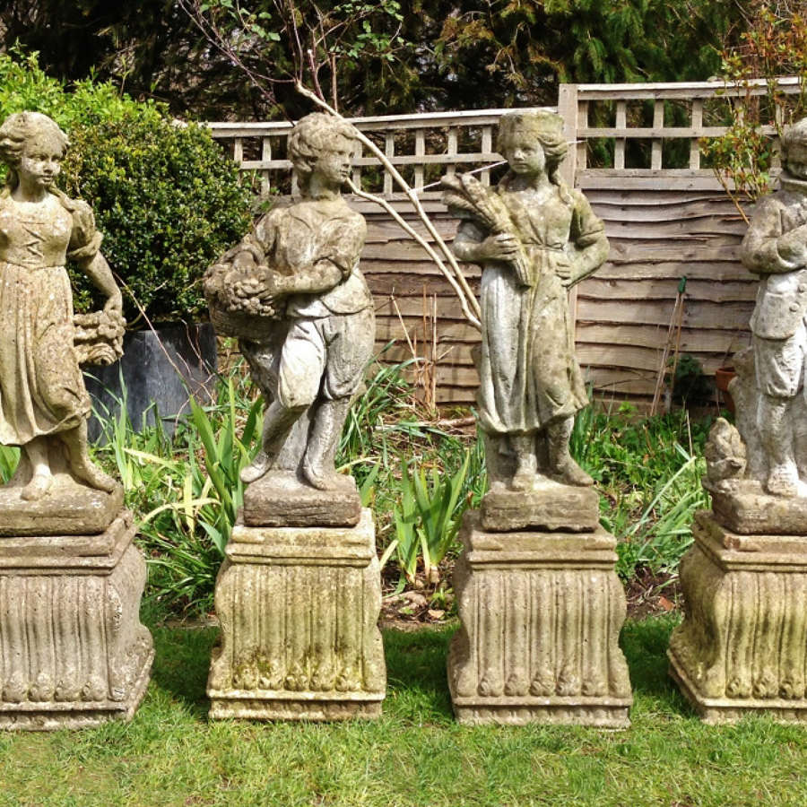 Set of Four Season Figures with Pedestals