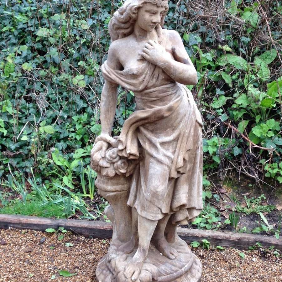 Statue of a Semi-Clad Maiden