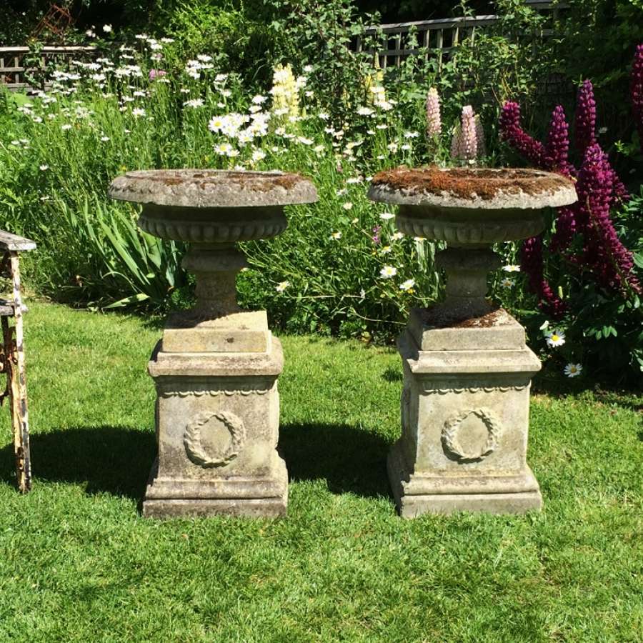 Pair of Mossy Urns and Pedestals