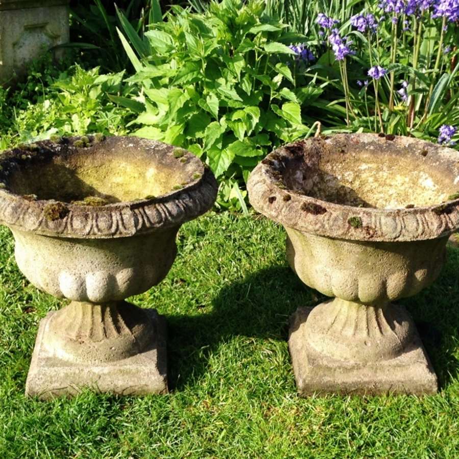 Pair of Small Weathered Urns