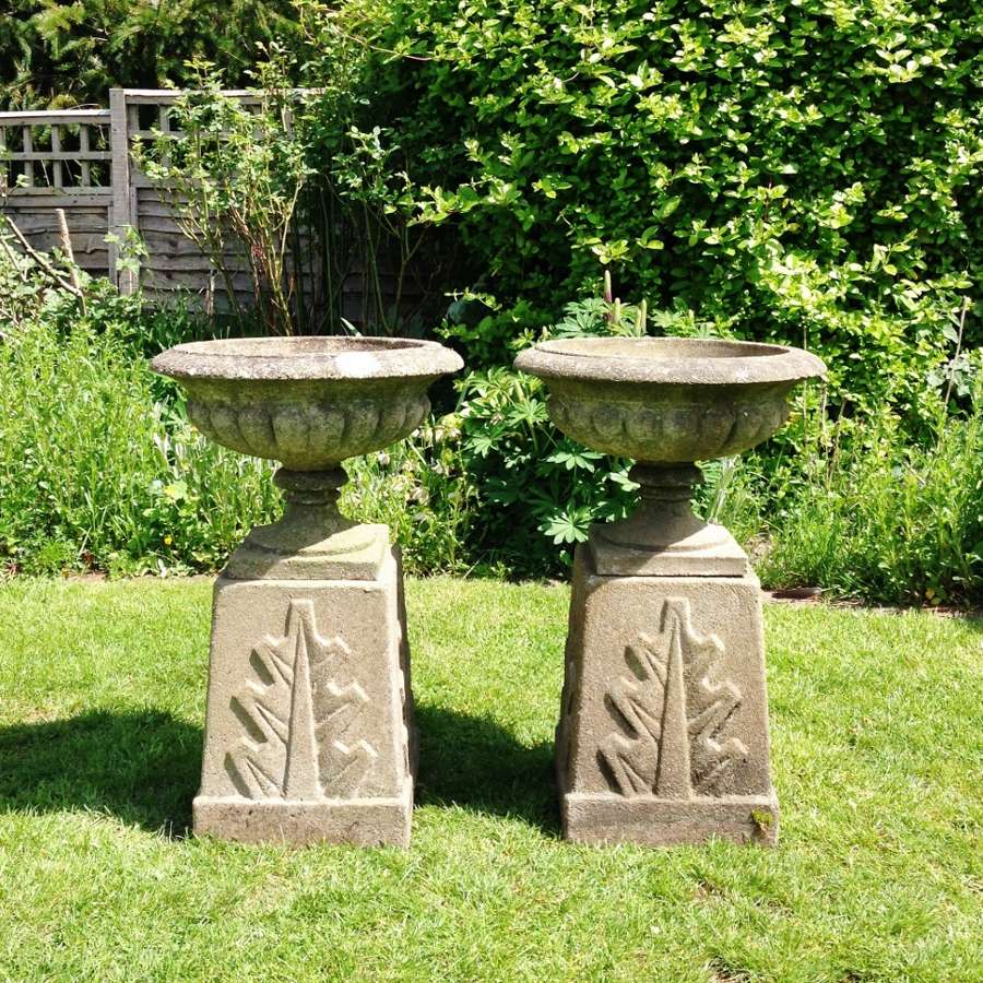 Pair of Lobed Urns on Deco Pedestals