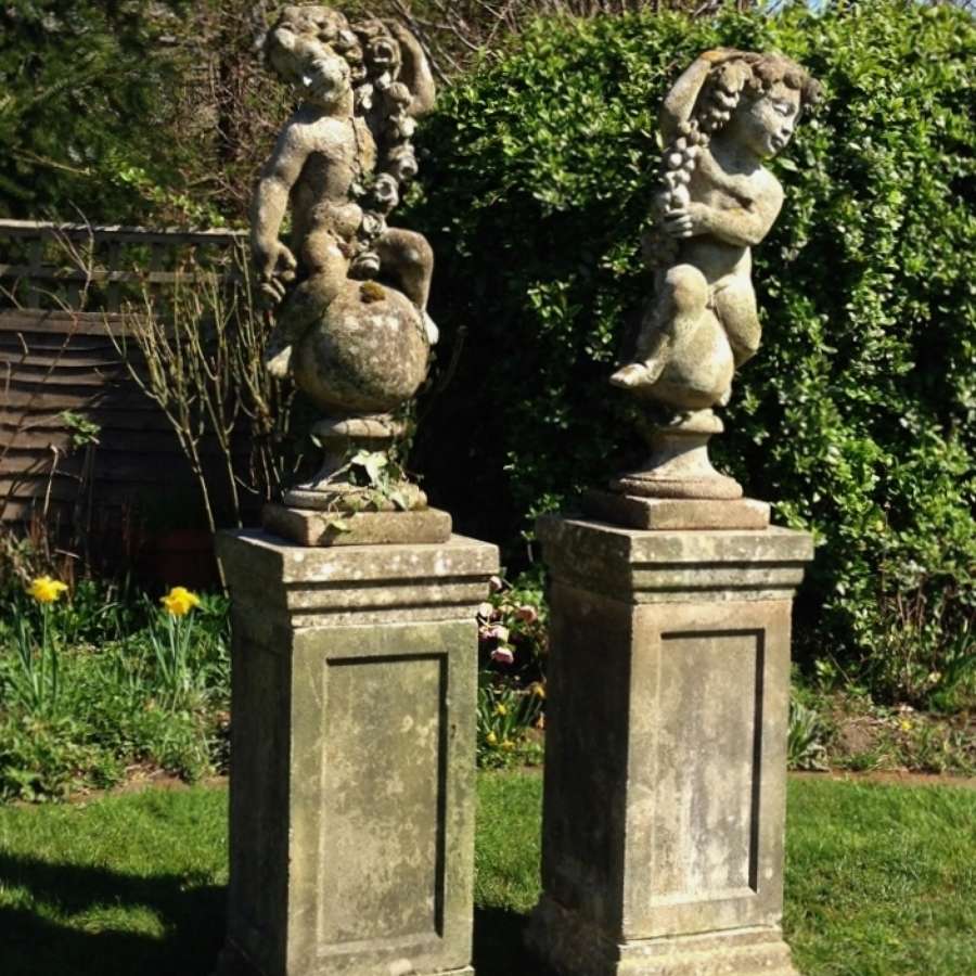 Pair of Cherubs on Pedestals