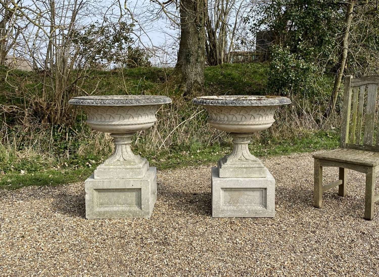 Pair of Large Eastwell Urns with Plinths