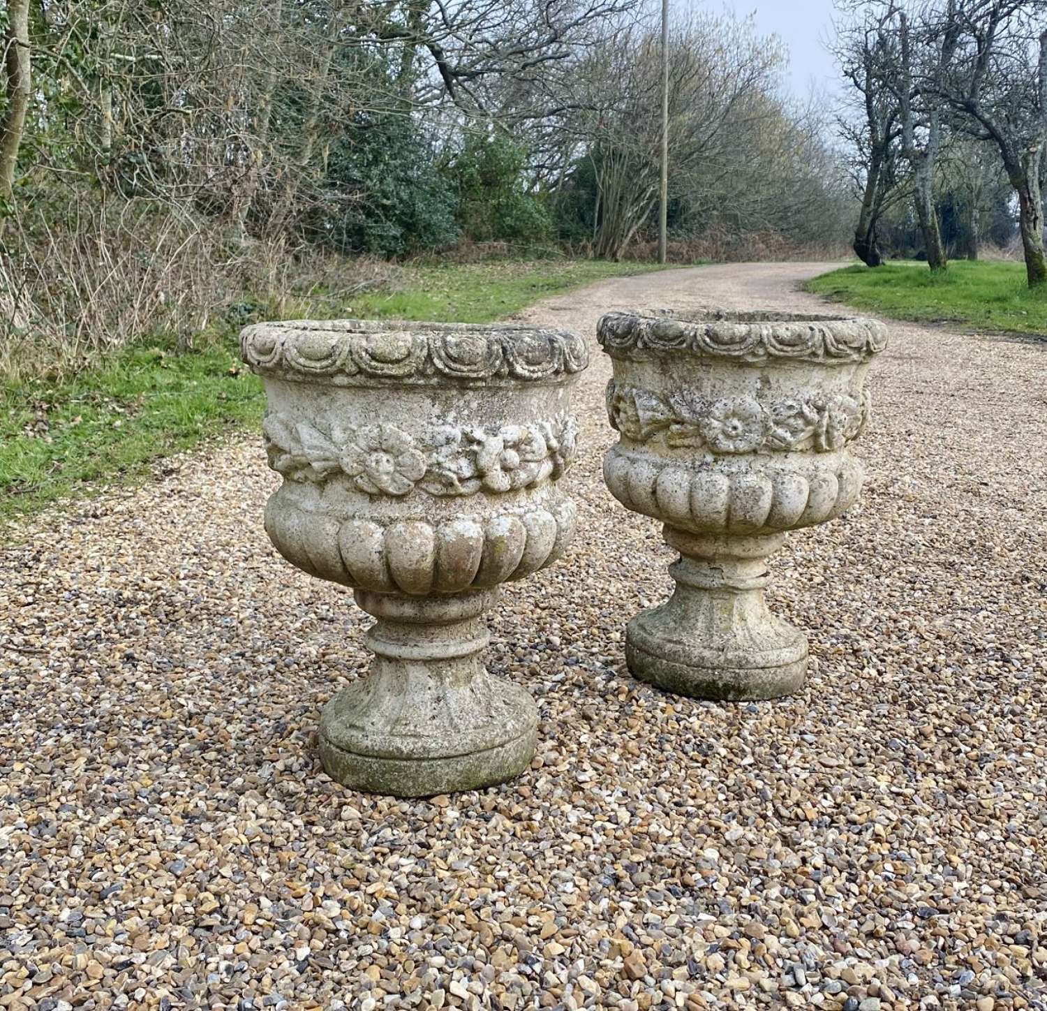 Pair of Patinated Flower Urns