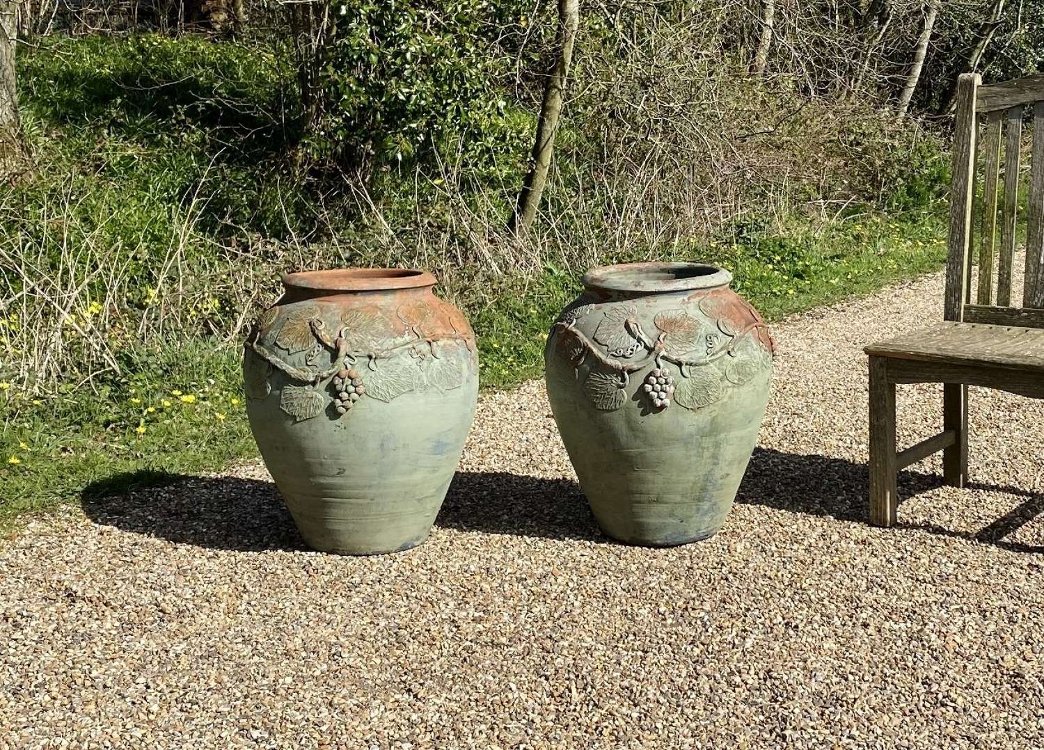Pair of Terracotta Amphoras with Green Paint