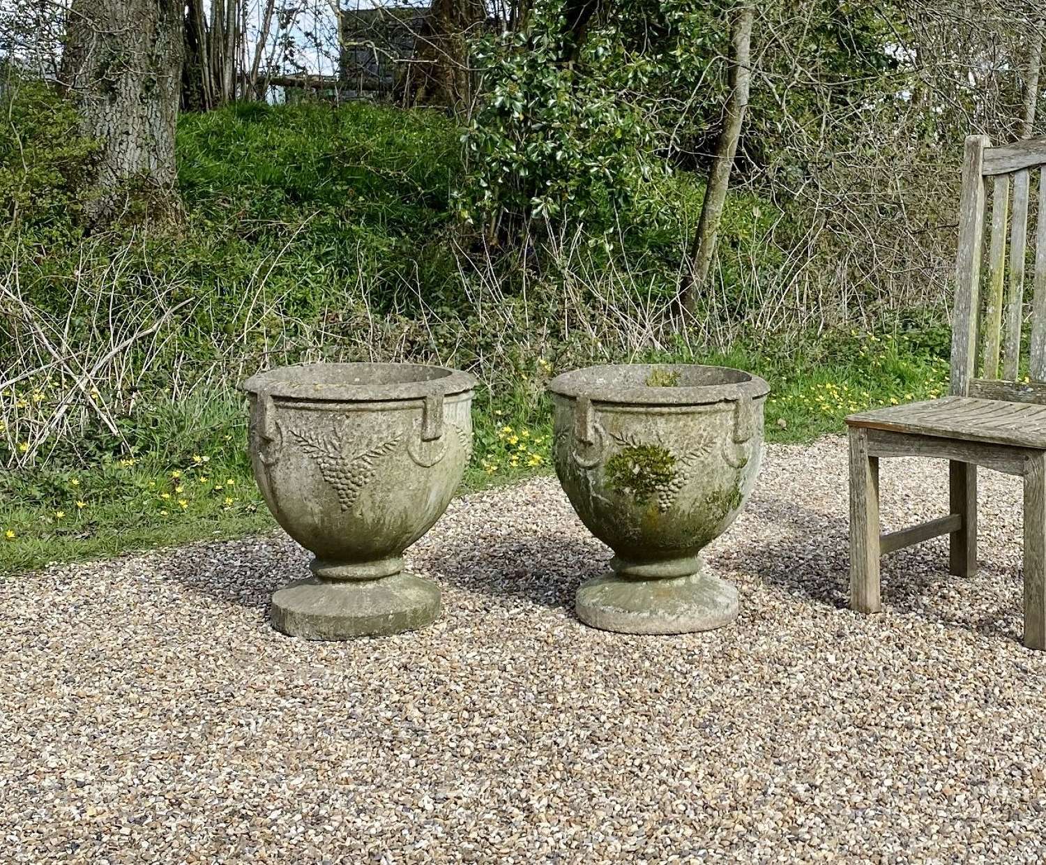 Pair of Patinated Grape Urns