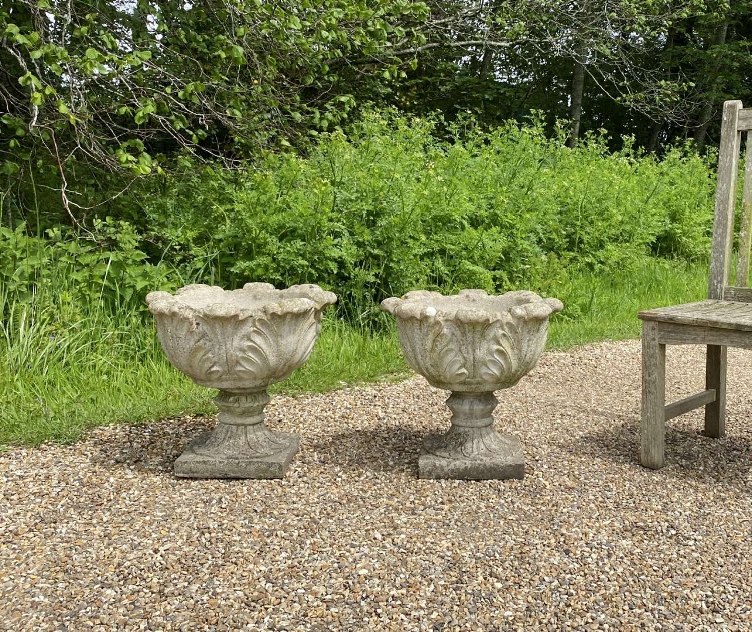 Pair of Weathered Acanthus Urns