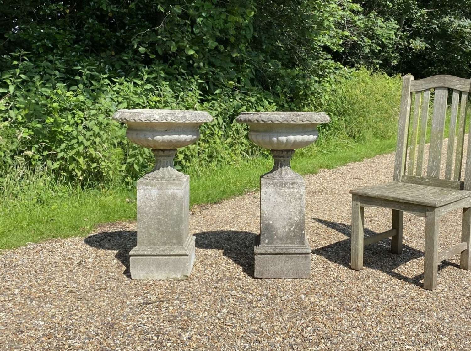 Pair of Small Classic Urns with Pedestals