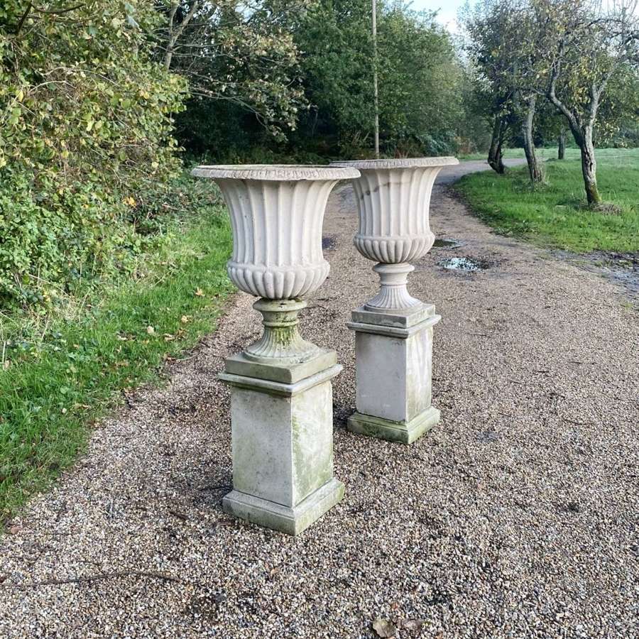 Pair of Large Campania Urns with Pedestals