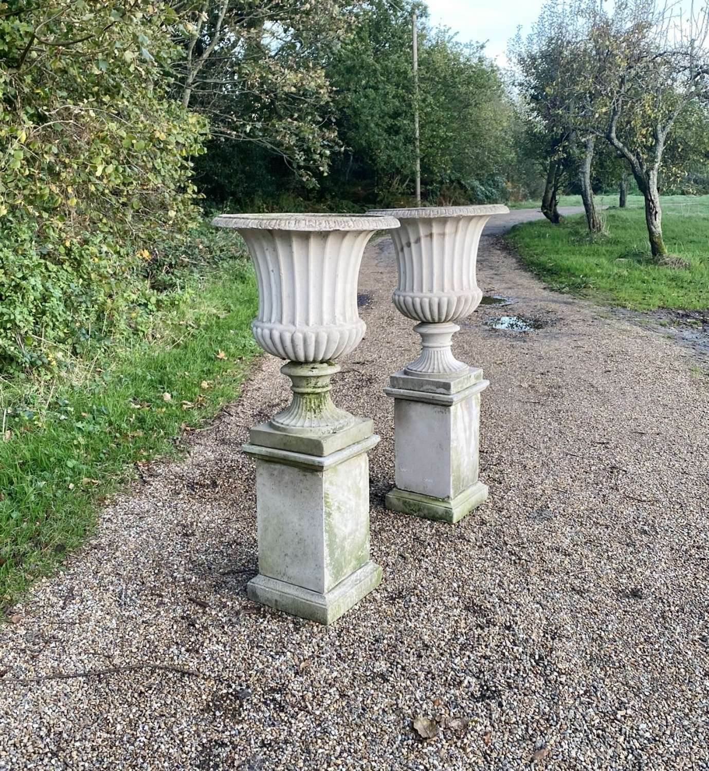 Pair of Large Campania Urns with Pedestals