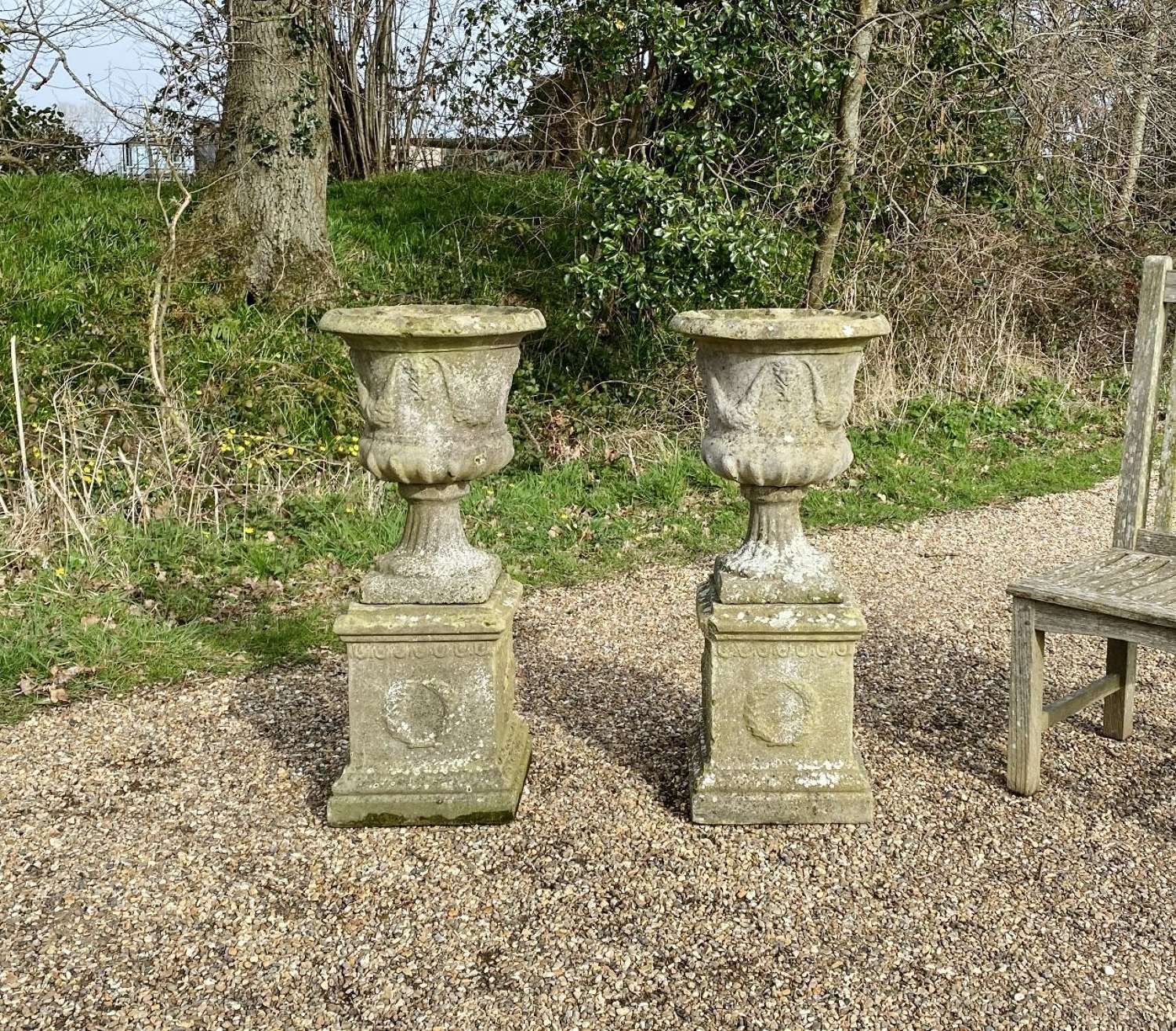 Pair of Garland Urns on Pedestals