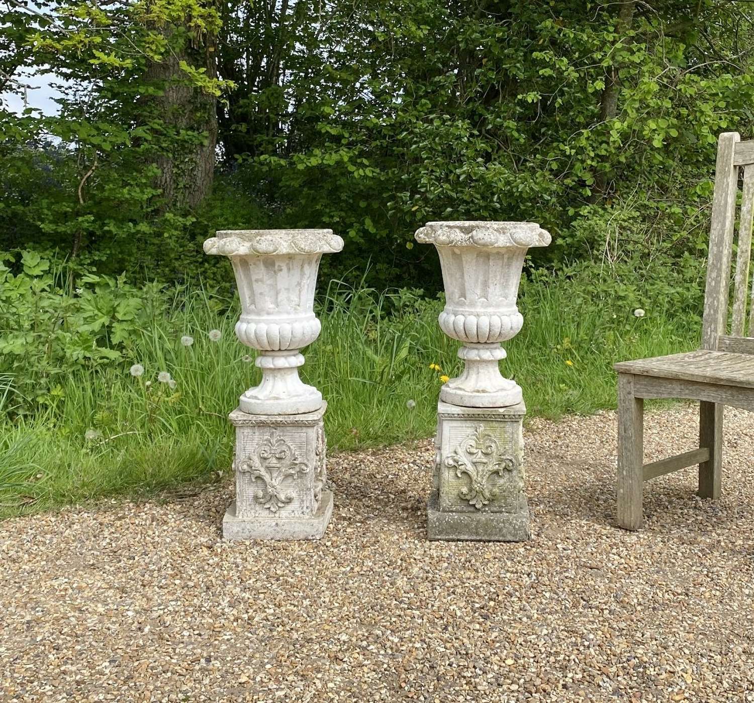 Pair of Small Italian Urns with Pedestals