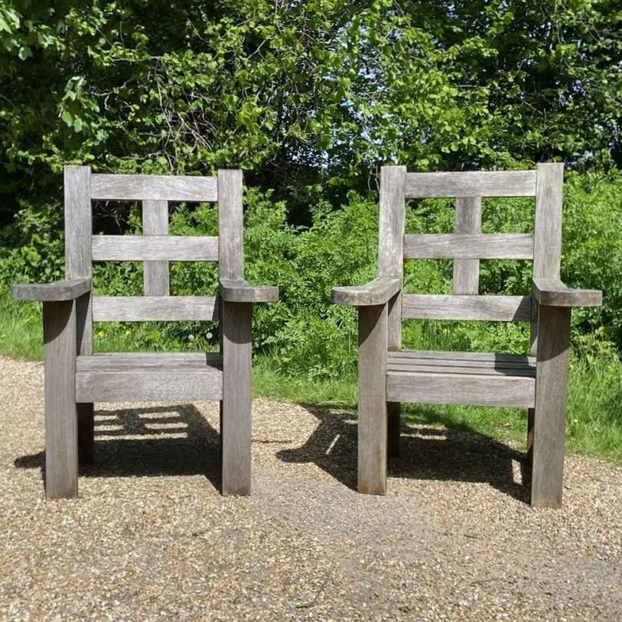 A pair of Large Teak Chairs