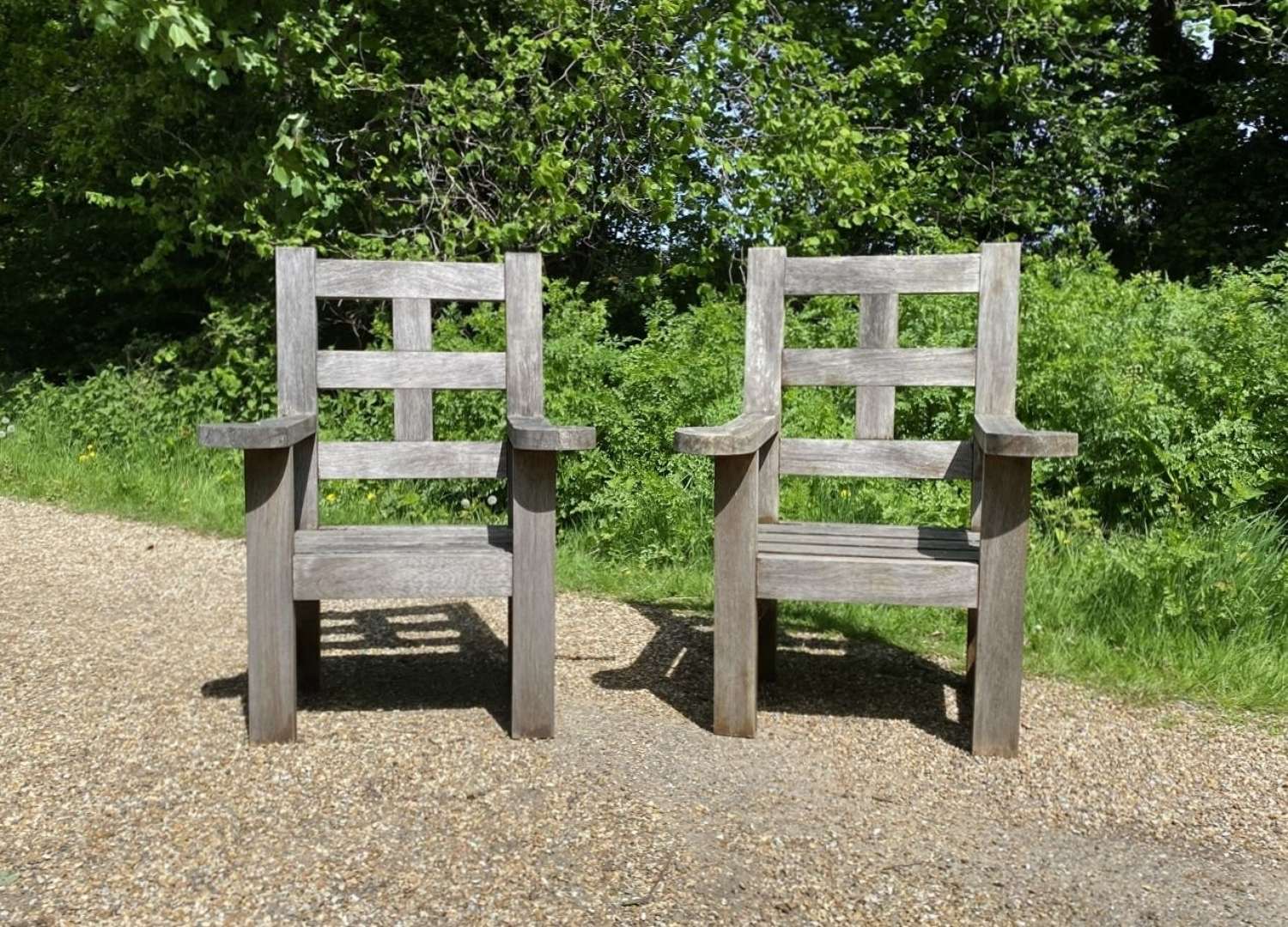 A pair of Large Teak Chairs