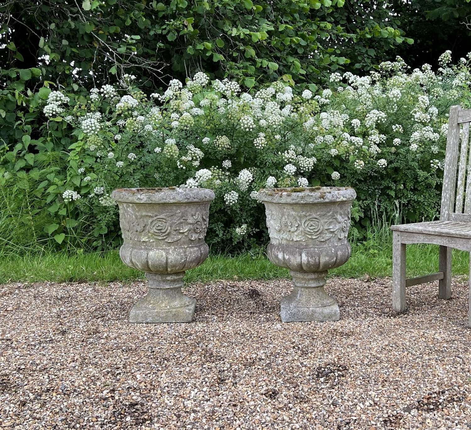 Pair of Large Patinated Flower Urns