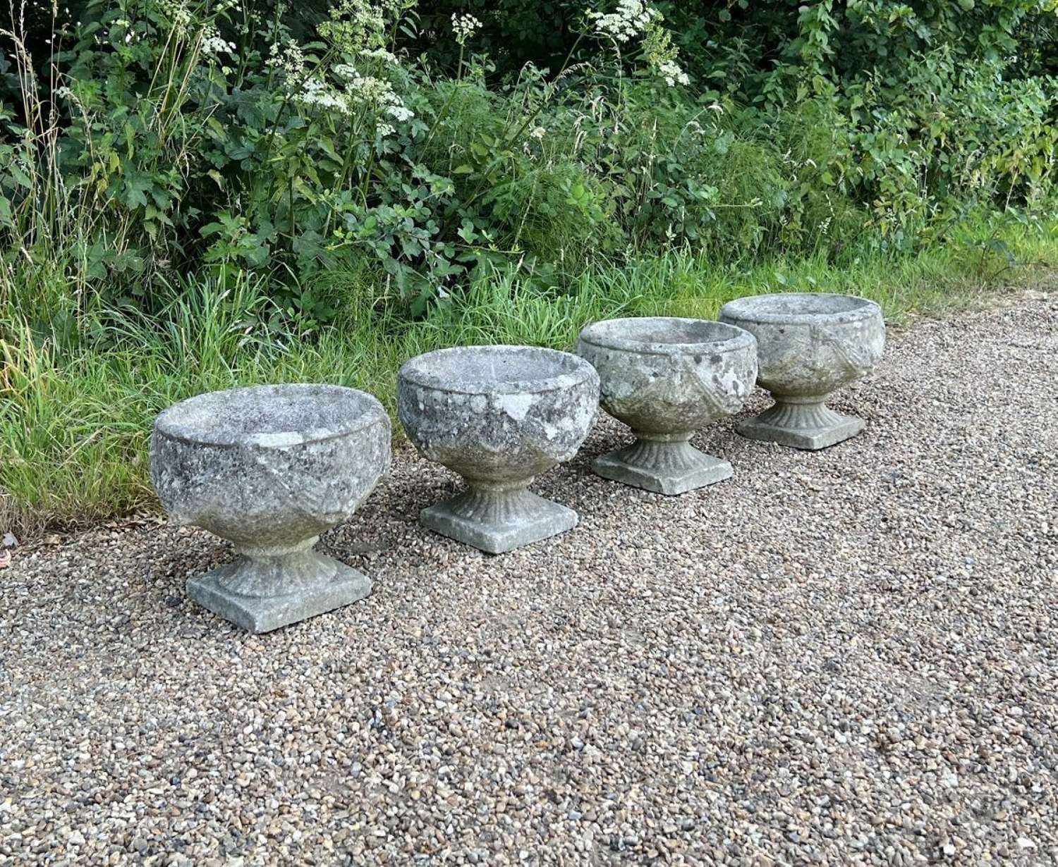 Set of 4 Patinated Goblet Urns
