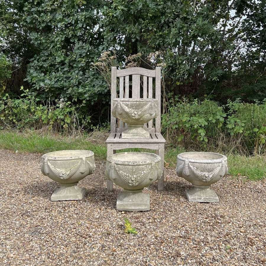 Pair of Weathered Goblet Urns
