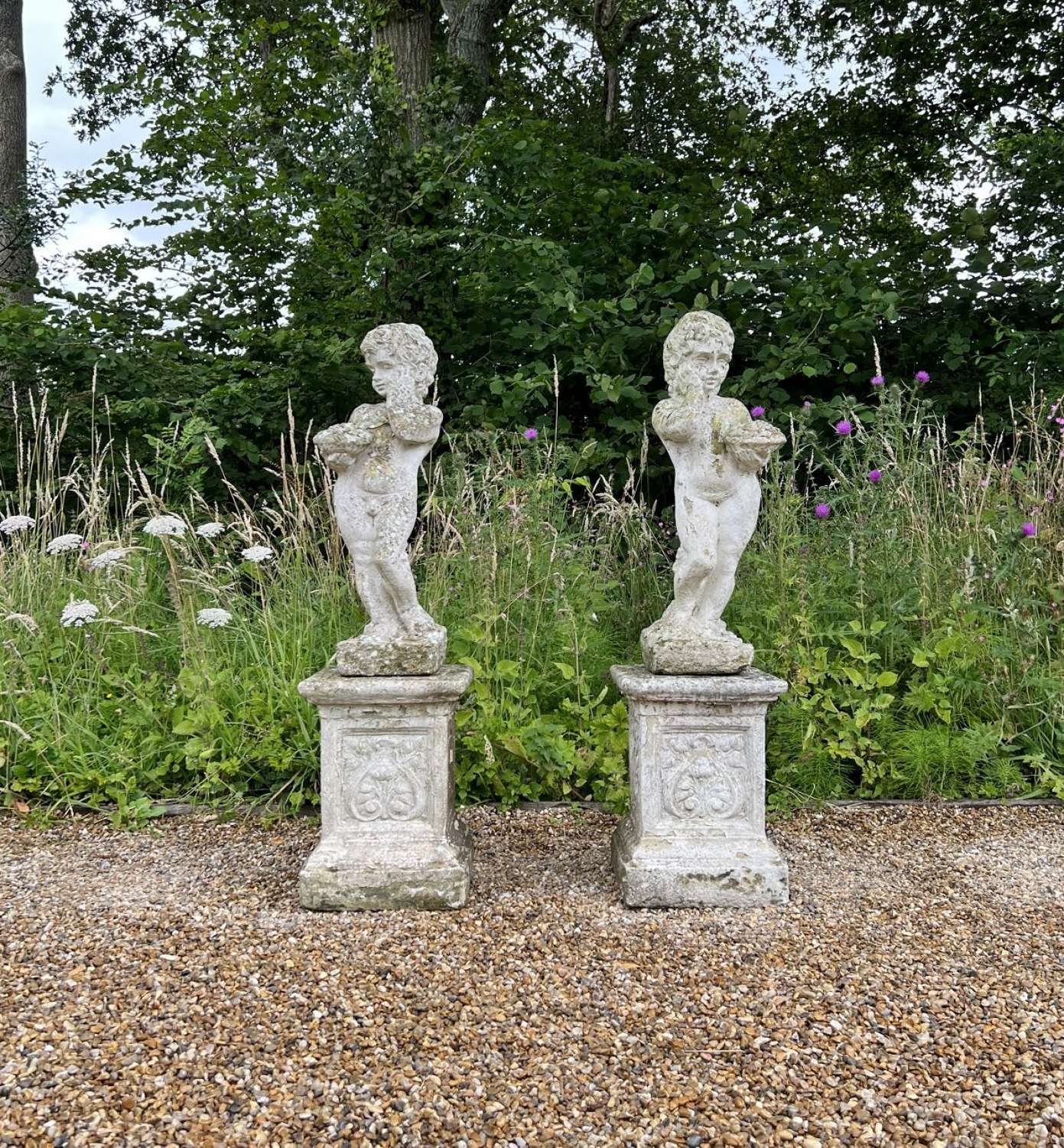 Pair of Cherubs with Pedestals