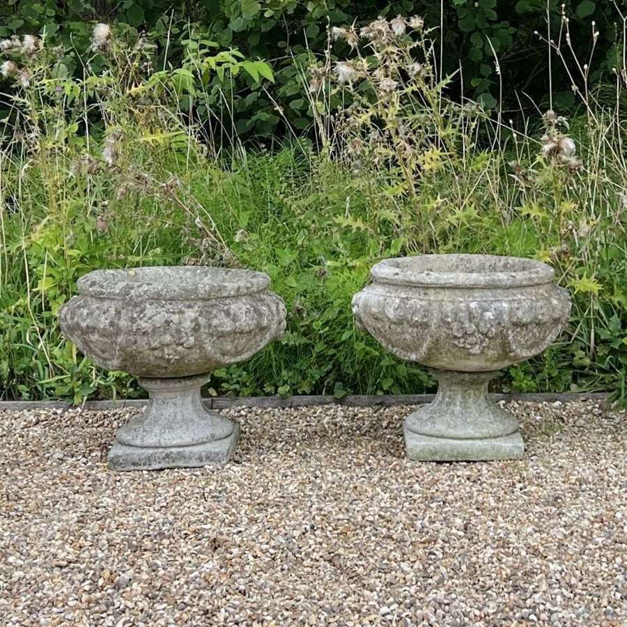 Pair of Weathered Fruit Urns