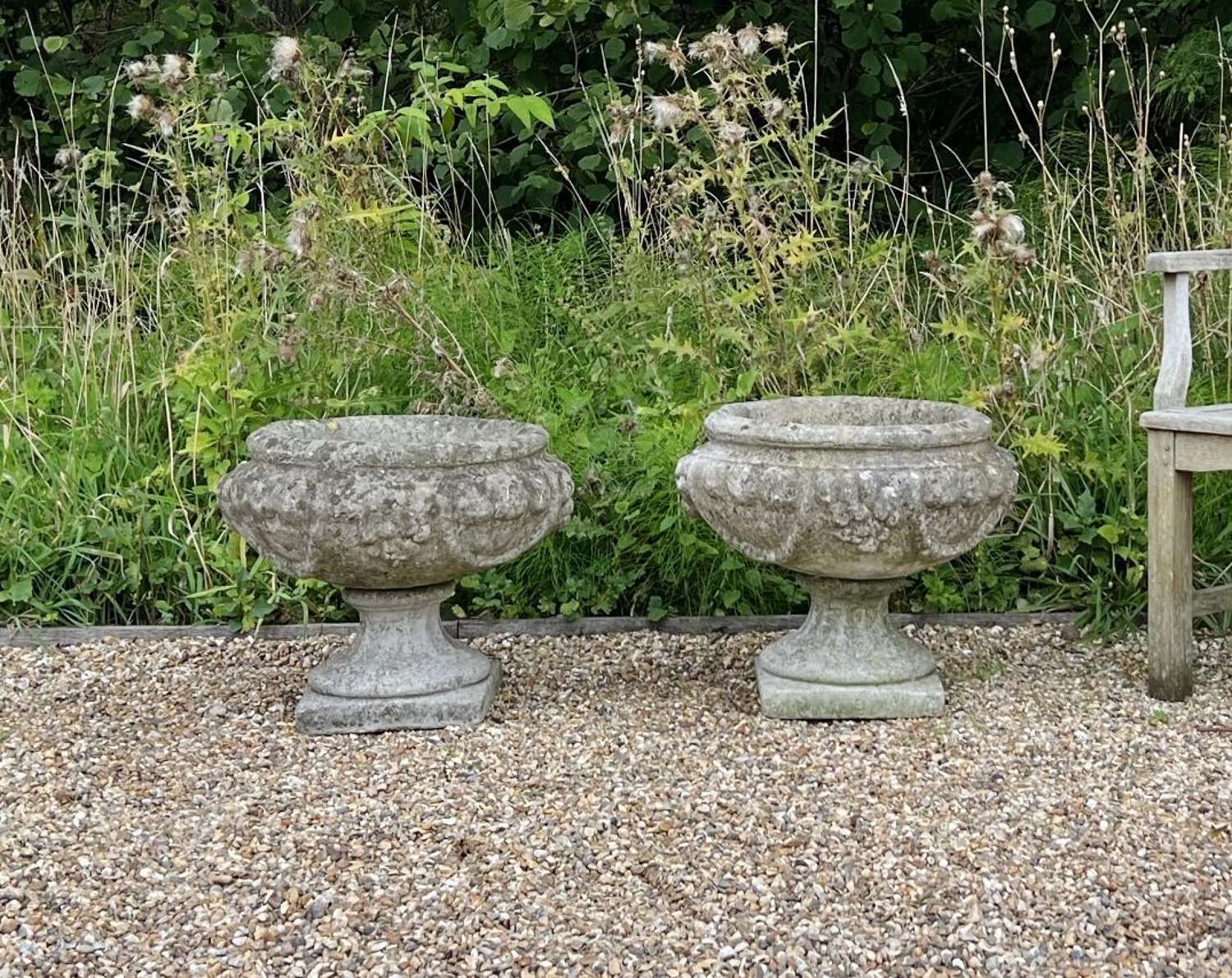 Pair of Weathered Fruit Urns