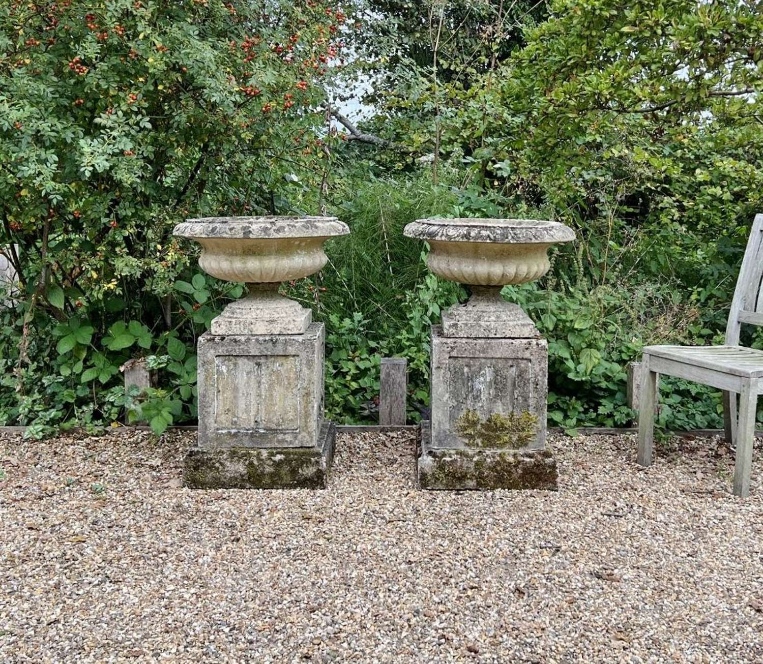 Pair of Mid-Century Urns and Pedestals