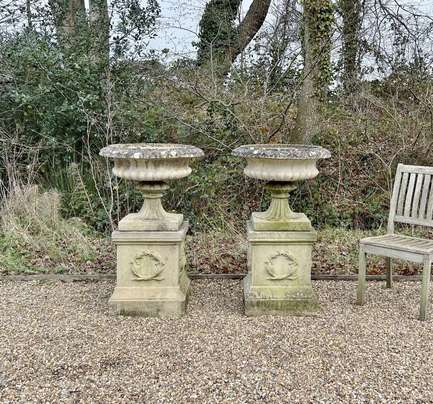 Pair of Large Sandford Stone Urns with Pedestals