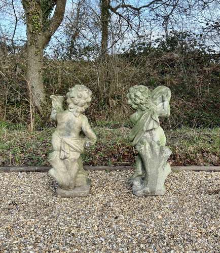 Pair of Patinated Cherubs
