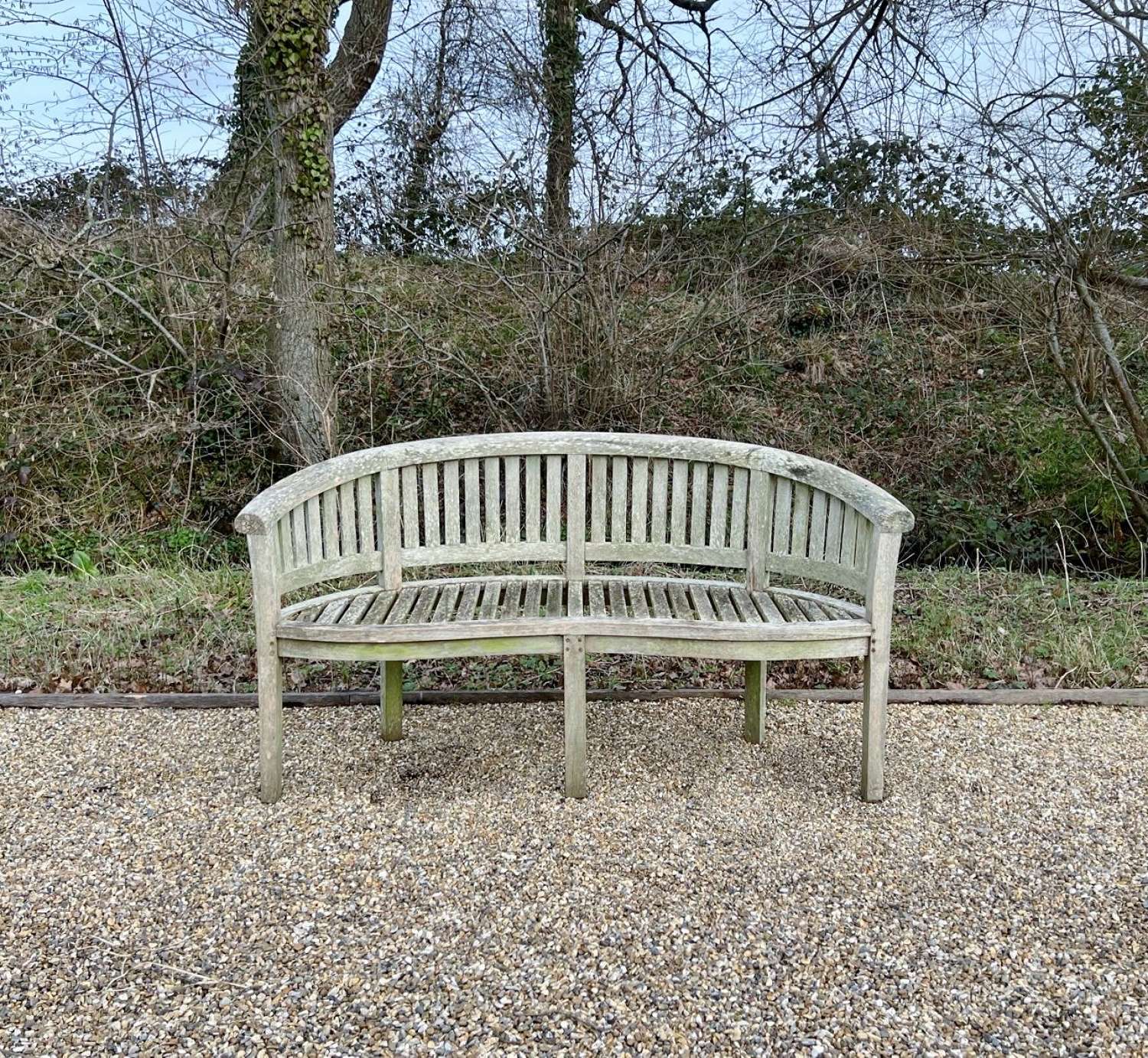 Weathered Curved Bench