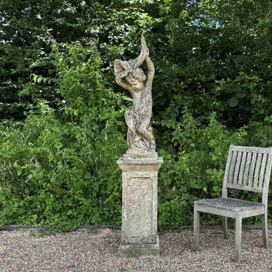 Patinated Shell Boy Fountain on Tall Pedestal